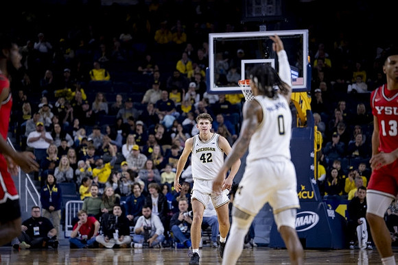 Will Tschetter (42) and Dug McDaniel (0)