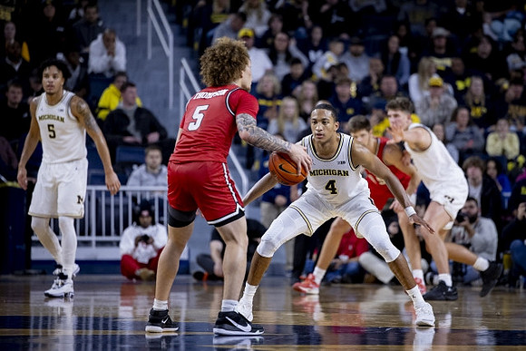 Terrance Williams II (5), Nimari Burnett (4), and Will Tschetter (42)