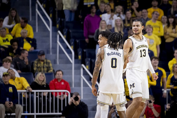 Terrance Williams II (5), Dug McDaniel (0), and Olivier Nkamhoua (13)