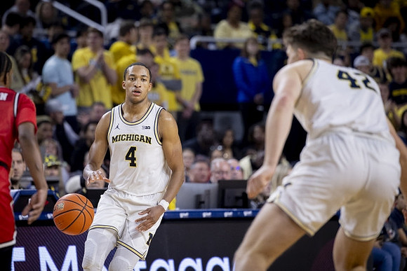 Nimari Burnett (4) and Will Tschetter (42)