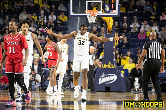 Terrance Williams II (5), Olivier Nkamhoua (13), and Tarris Reed Jr. (32)