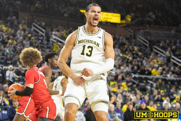 Nimari Burnett (4) and Olivier Nkamhoua (13)
