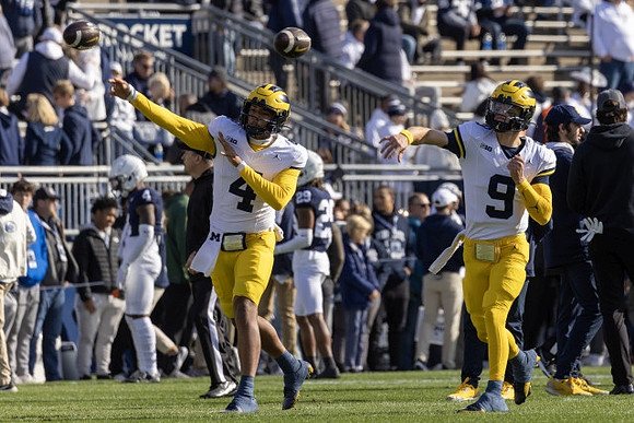 Jayden Denegal (4) and J.J. McCarthy (9)