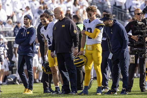 Roman Wilson (1), Ben Herbert, and J.J. McCarthy (9)