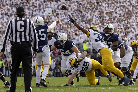 Mason Graham (55) and Jaylen Harrell (32)