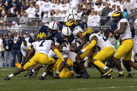 Makari Paige (7) and Junior Colson (25)