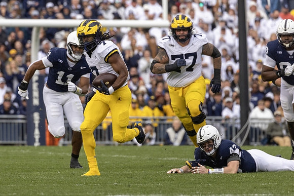 Donovan Edwards (7) and Trevor Keegan (77)