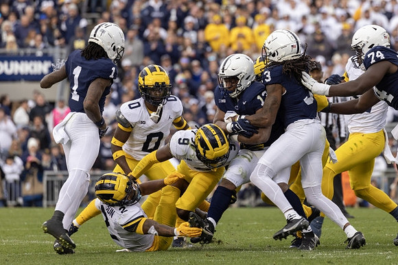 Will Johnson (2), Mike Sainristil (0), and Rod Moore (9)