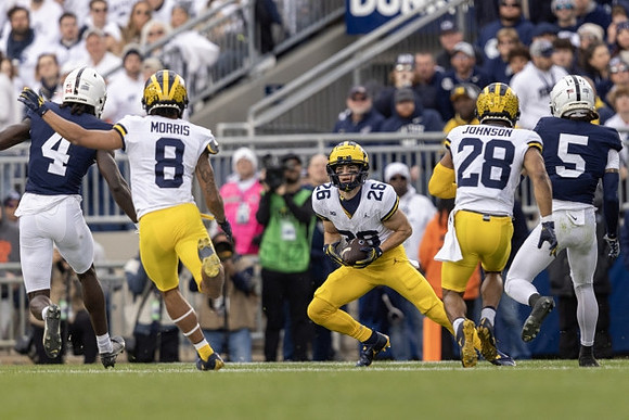 Tyler Morris (8), Jake Thaw (26), and Quinten Johnson (28)