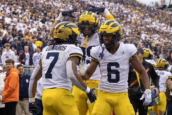 Donovan Edwards (7), AJ Barner (89), and Cornelius Johnson (6)