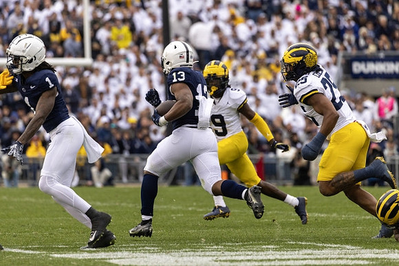 Rod Moore (9) and Junior Colson (25)
