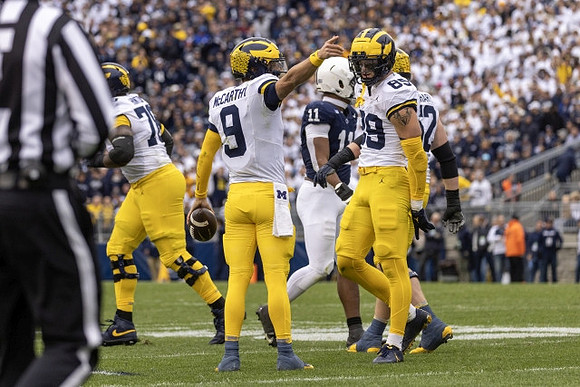 Myles Hinton (78), J.J. McCarthy (9), AJ Barner (89), and Karsen Barnhart (52)