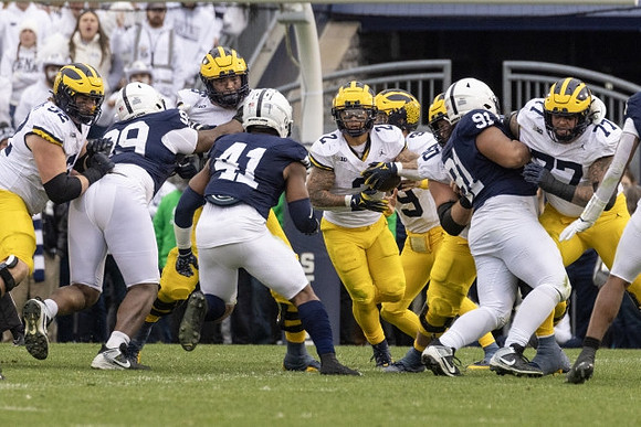 Karsen Barnhart (52), Blake Corum (2), J.J. McCarthy (9), and Trevor Keegan (77)