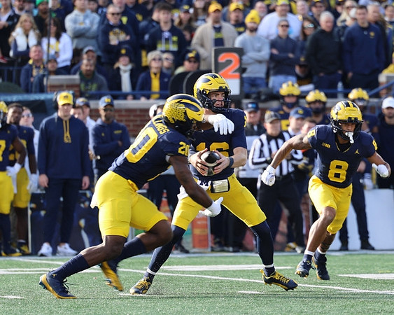 Kalel Mullings (20), Davis Warren (16), and Tyler Morris (8)