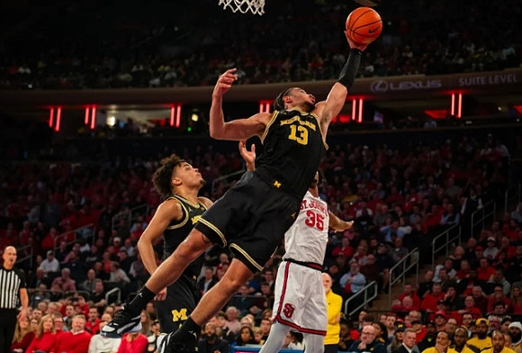 Terrance Williams II (5) and Olivier Nkamhoua (13)