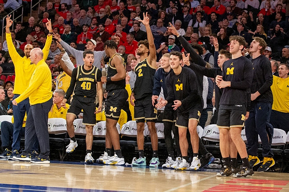 Phil Martelli, Saddi Washington, and Michigan Team