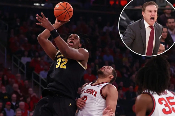 Tarris Reed Jr. (32) and St. John's Head Coach Rich Pitino