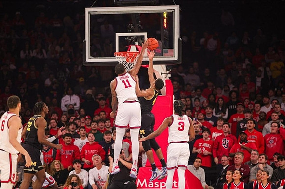 Tarris Reed Jr. (32) and Nimari Burnett (4)