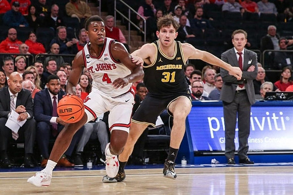 Harrison Hochberg (31) and St. John's Head Coach Rich Pitino