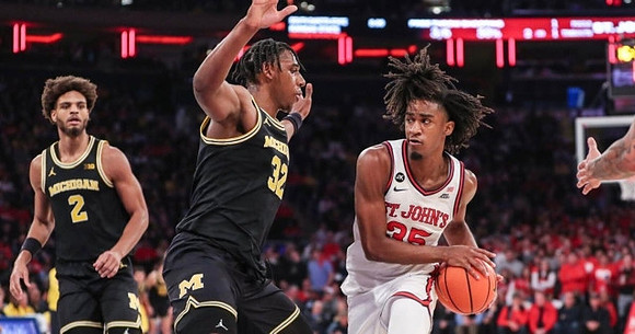 Tray Jackson (2) and Tarris Reed Jr. (32)