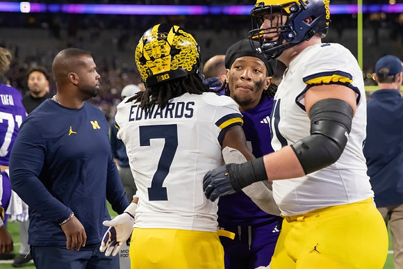 Donovan Edwards (7) and Evan Link (71)