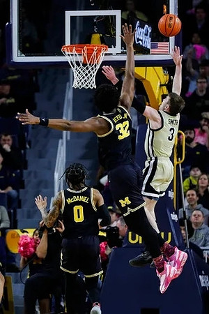 Dug McDaniel (0) and Tarris Reed Jr. (32)