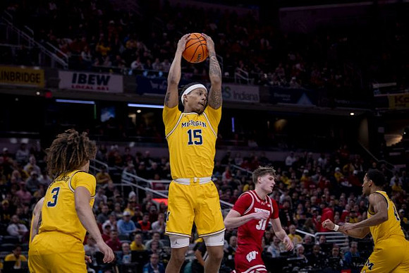 Tre Donaldson (3), Rubin Jones (15), and Nimari Burnett (4)