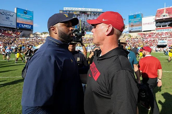 Sherrone Moore and Alabama Head Coach Kalen DeBoer