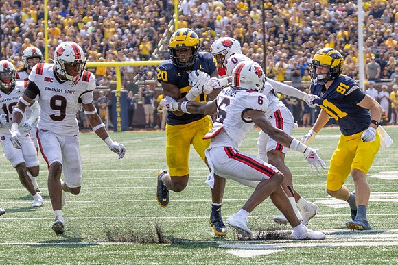 Kalel Mullings (20) and Peyton O'Leary (81)
