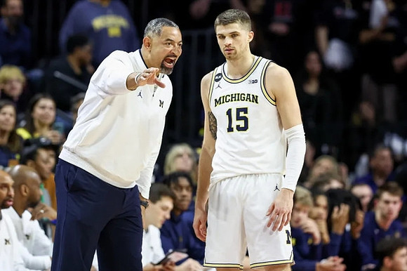 Juwan Howard and Joey Baker (15)