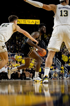 Will Tschetter (42) and Olivier Nkamhoua (13)