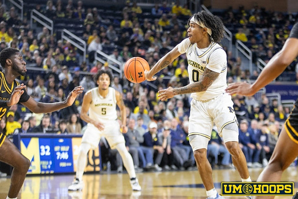 Nimari Burnett (4) and Dug McDaniel (0)