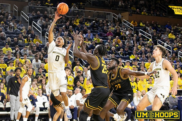 Dug McDaniel (0) and Will Tschetter (42)