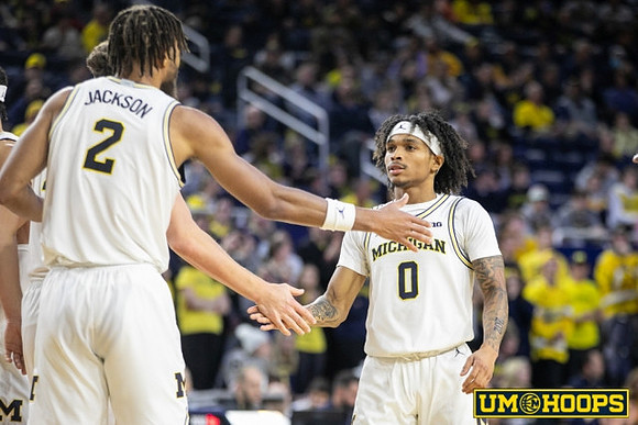 Tray Jackson (2) and Dug McDaniel (0)