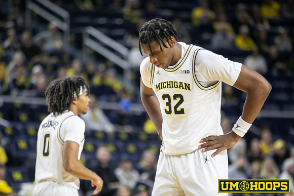 Dug McDaniel (0) and Tarris Reed Jr. (32)