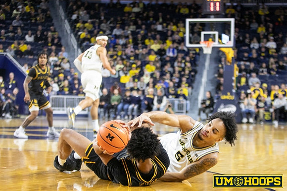 Olivier Nkamhoua (13) and Terrance Williams II (5)