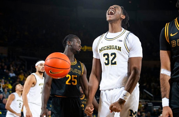 Terrance Williams II (5), Olivier Nkamhoua (13), and Tarris Reed Jr. (32)