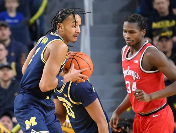 Kobe Bufkin (2) and Jett Howard (13)