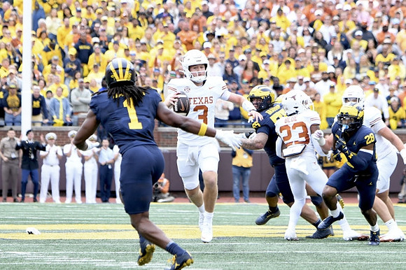 Jaishawn Barham (1), Mason Graham (55), and Quinten Johnson (28)