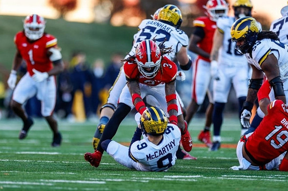 Karsen Barnhart (52), J.J. McCarthy (9), and Trente Jones (53)