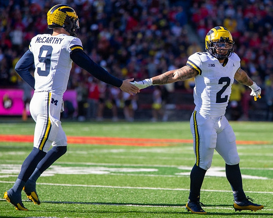 J.J. McCarthy (9) and Blake Corum (2)