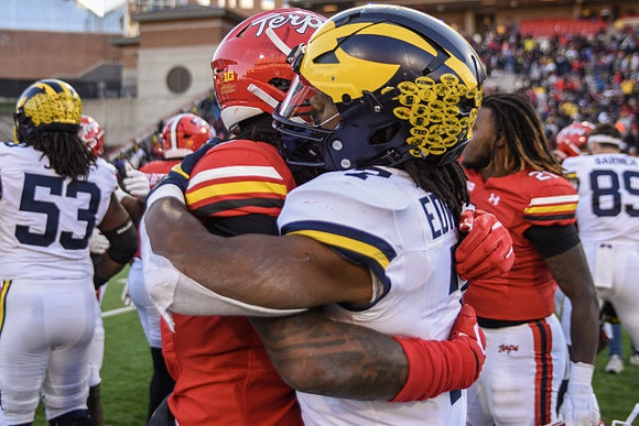 Trente Jones (53), Donovan Edwards (7), and AJ Barner (89)