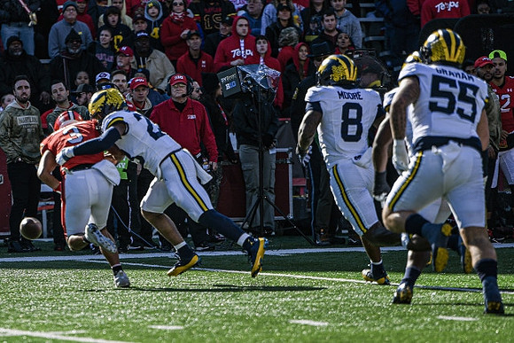 Michael Barrett (23), Derrick Moore (8), and Mason Graham (55)