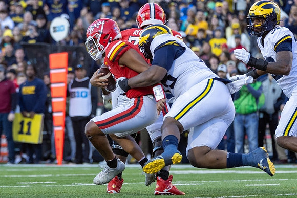 Kenneth Grant (78) and Jaylen Harrell (32)