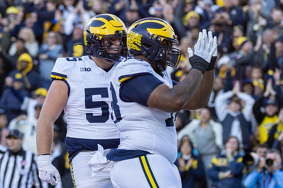 Mason Graham (55) and Kenneth Grant (78)