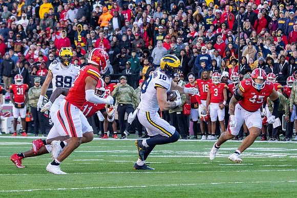 AJ Barner (89) and Colston Loveland (18)