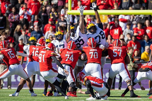 Rod Moore (9), Braiden McGregor (17), Mason Graham (55), and Kenneth Grant (78)