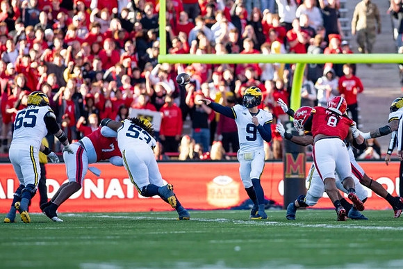 Zak Zinter (65), Trente Jones (53), and J.J. McCarthy (9)