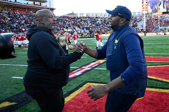 Maryland Head Coach Mike Locksley and Sherrone Moore