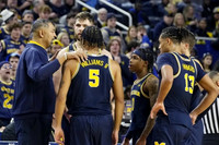 Juwan Howard, Hunter Dickinson (1), Terrance Williams II (5), Dug McDaniel (0), Joey Baker (15), and Jett Howard (13)